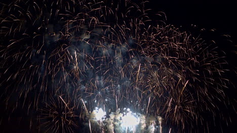 the finale of a fireworks display makes it look like the sky is raining streaks of fire