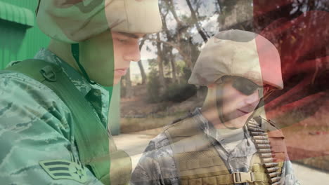 digital composition of waving italy flag against two soldiers reading a map at training camp