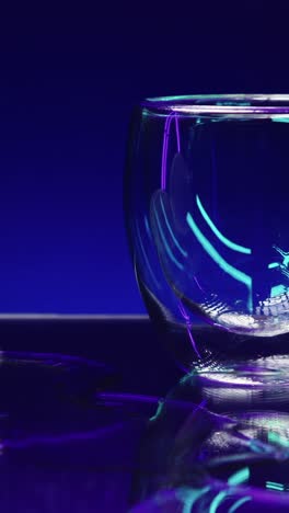 vibrant green soda pouring into a glass