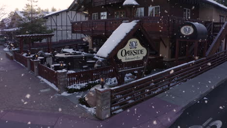 charming heavy white snowfall on closed famous restaurant in big bear city, ca