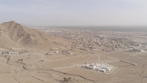 aerial view showing dense urban housing in tunisia against the vast dry terrain