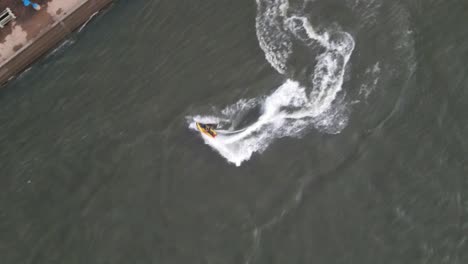 jet skiing at lake pontchartrain in louisiana, usa