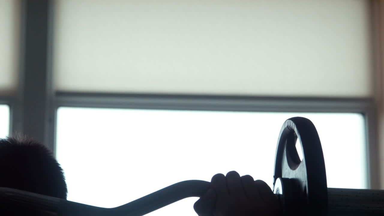 Person, hands and silhouette with tablet screen in studio for advertising on a white background (Stock Footage)