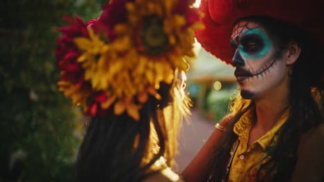couple in day of the dead costumes