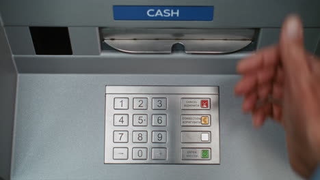 person using an atm