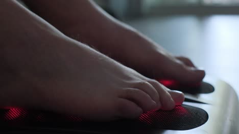 closeup of a foot massage using a home massager prevention of foot disease closeup of a foot massage using a home massager prevention of foot disease