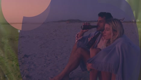 animation of caucasian couple drinking beer over sunset and circles