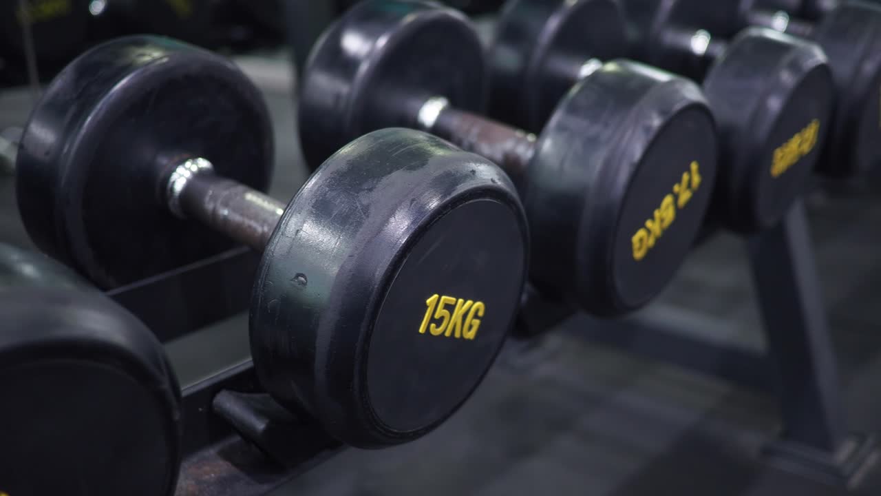 Dumbbells on a rack in a gym