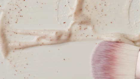 Applying a Natural Face Scrub with a Makeup Brush
