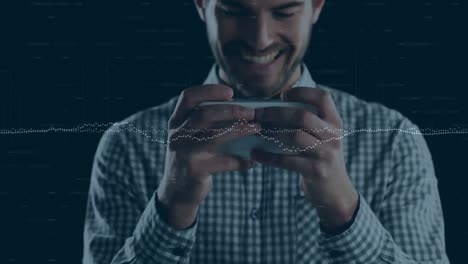 gráficos estadísticos sobre el hombre caucásico que usa un teléfono inteligente contra un fondo negro