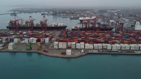 Drone-video-of-shipping-container-yard-on-the-sea-port-of-Callao,-in-Peru