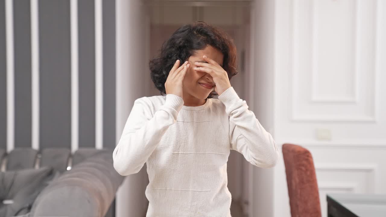 Unhappy Indian kid boy getting shocked