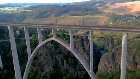 aerial view of the new ulla viaduct with old gundian bridge in background in galicia