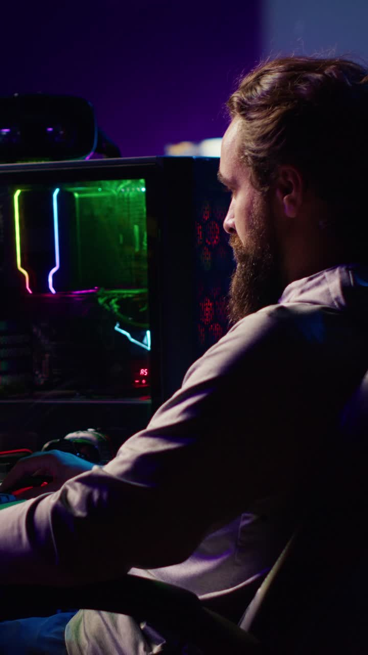 Vertical video Gamer competing in PvP online multiplayer game tourney against opponents
