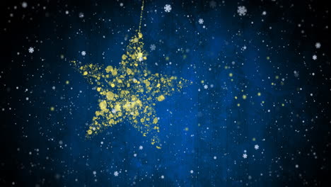 golden star made of particles with falling snowflakes animation on blue background
