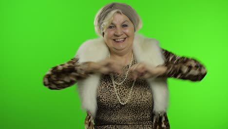 Elderly-stylish-grandmother.-Caucasian-woman-dancing,-celebrate.-Chroma-key