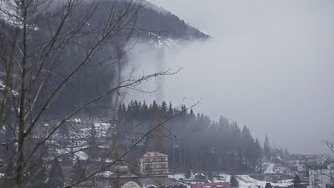 foggy cloud advancing over a frozen city