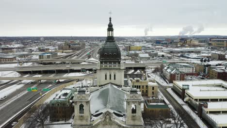 drone flies over basilica of saint mary in winter