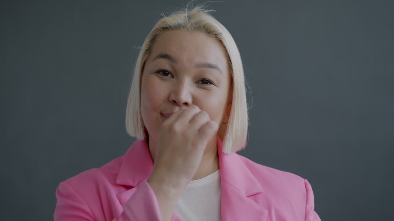 Portrait of a Woman in a Pink Blazer