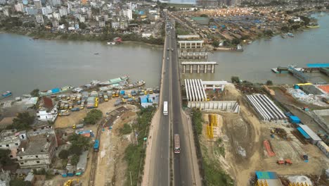 Areal-view-of-vehicles-passing-on-a-bridge