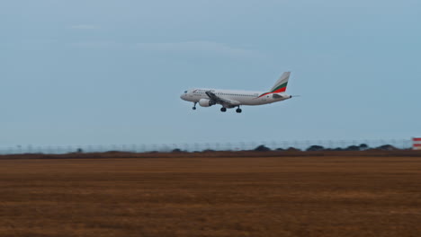 big jet plane landing to runway