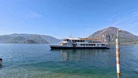 ferry arriving at dock in varenna, italy