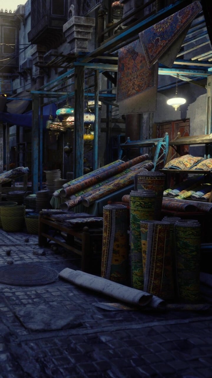 Via del mercato piena di tappeti e tessuti di notte in una città vivace