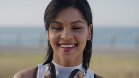 portrait-stylish-hispanic-woman-smiling-enjoying-successful-vacation-lifestyle-relaxing-attractive-young-female-looking-happy-on-warm-seaside-background