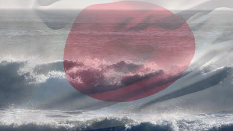 composición digital de la bandera de japón ondeando contra la vista aérea de las olas en el mar