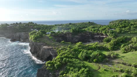 incredible little cove on nusa penida island with archway