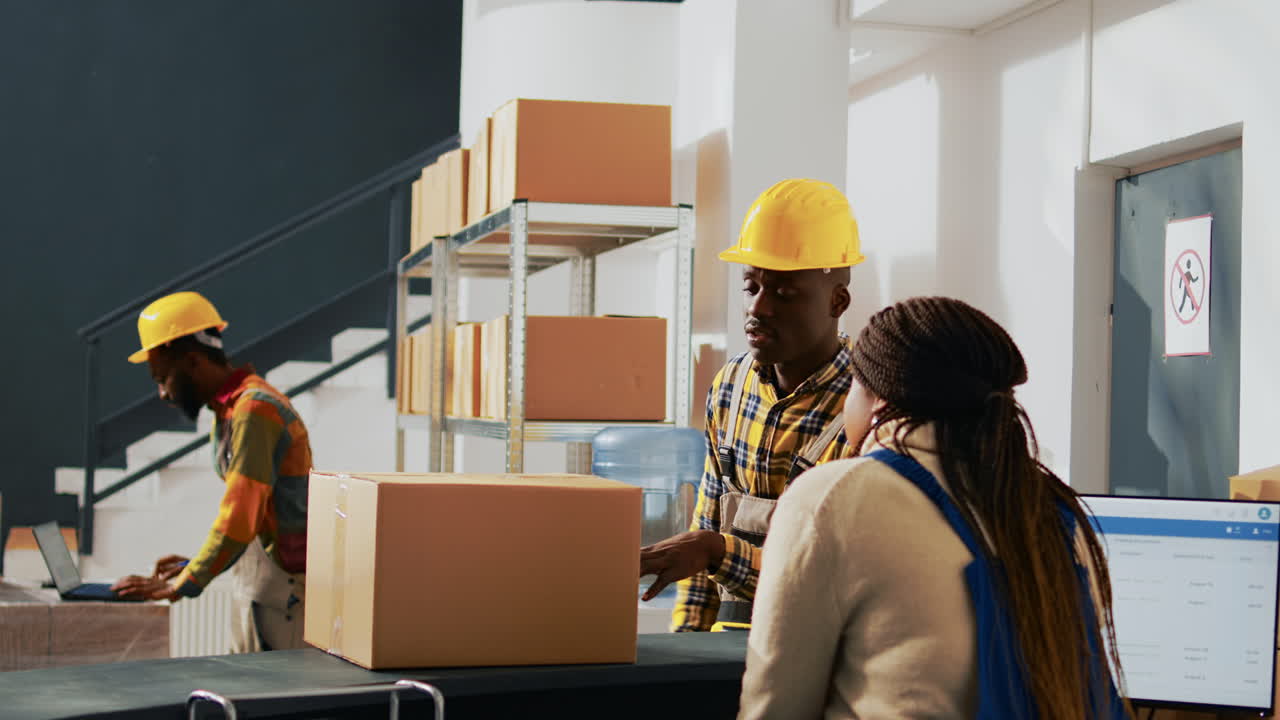 Warehouse workers handling boxes and deliveries