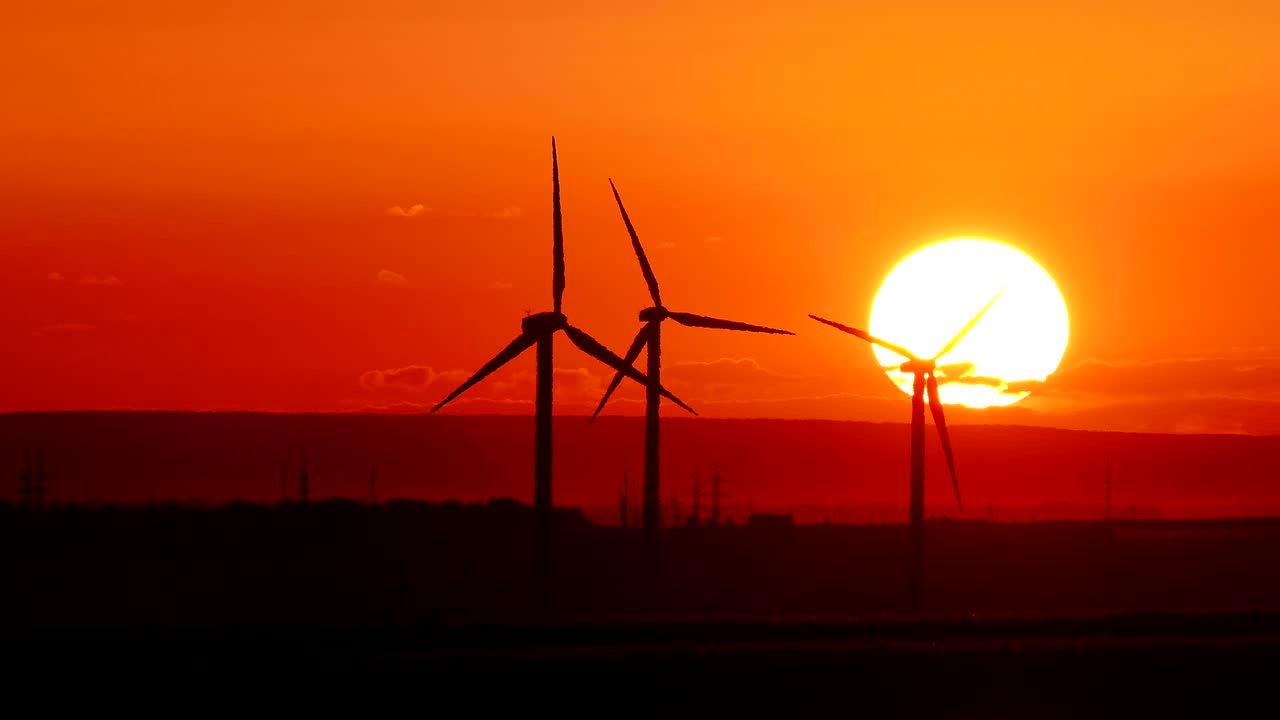 energía de molino de viento al atardecer eléctrico 4k
