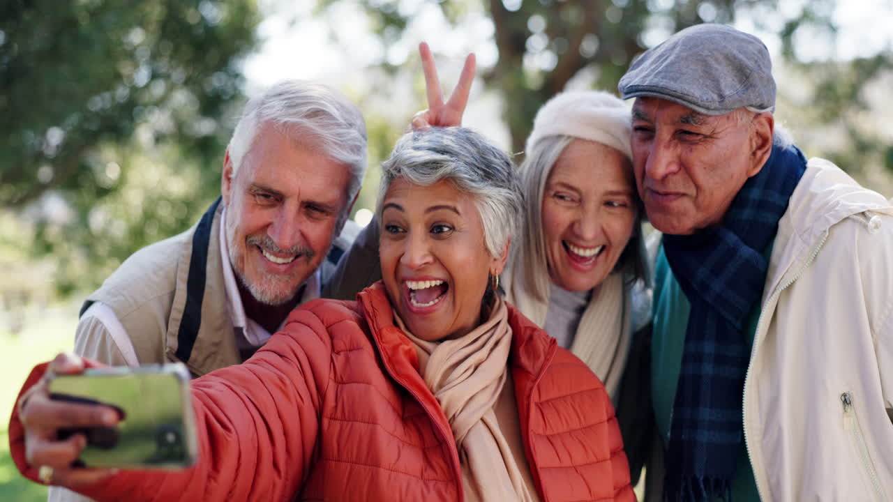 Group of Senior Citizens Taking a Selfie in the Park