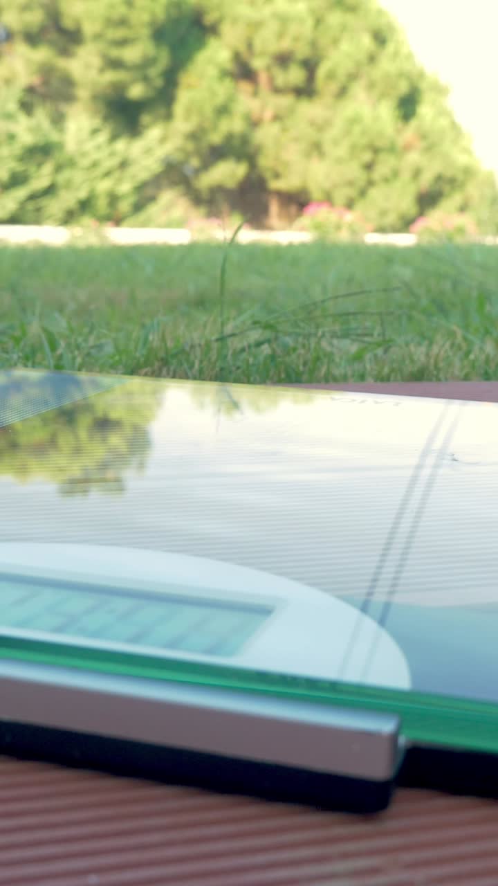 Weighing on a scale outdoors