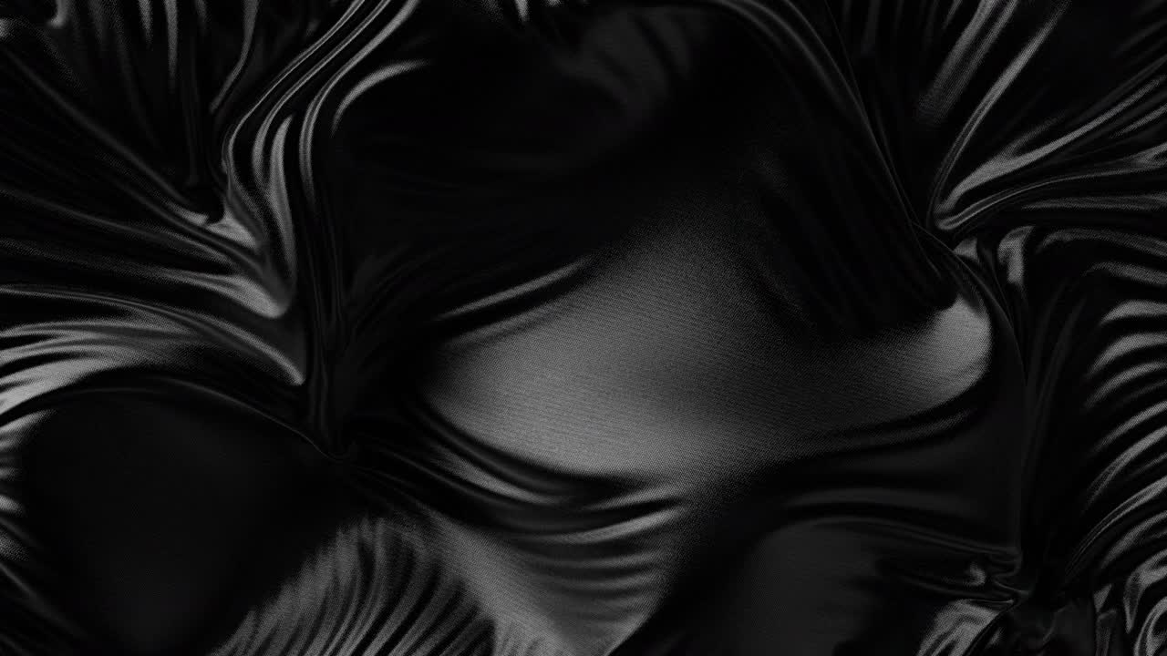 desarrollando en el viento una bandera de tela negra