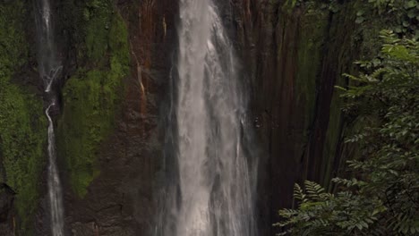 majestic catarata del toro, a powerful waterfall that plunges over a high cliff in costa rica