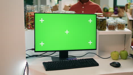 Seller-at-register-uses-greenscreen