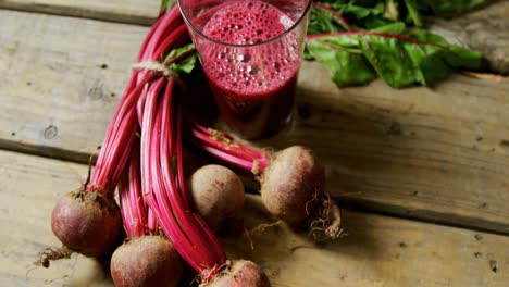 Radish-with-radish-juice-on-wooden-table-4k