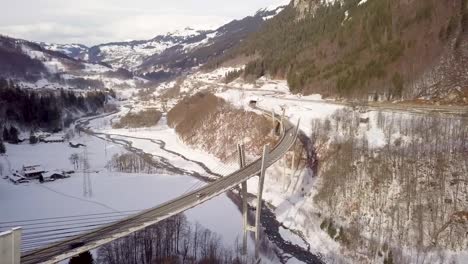 cars on a very high bridge in switzerland