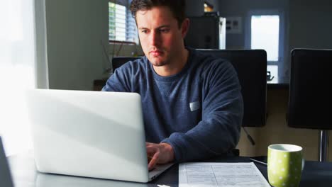 Disabled-man-checking-document-on-table-4k