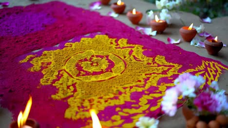 colorful indian religious decoration with candles and flowers