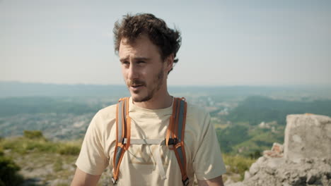 hiker on the top of mountain sabotin looking at the view