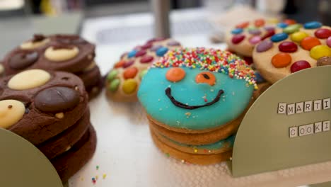 assorted cookies with vibrant decorations on display