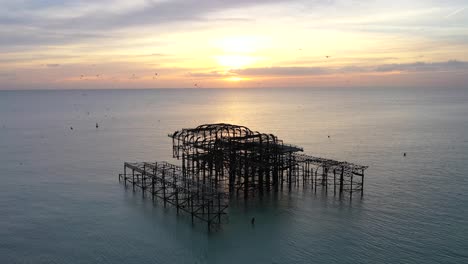 drone flight orbiting old pier ruins 1