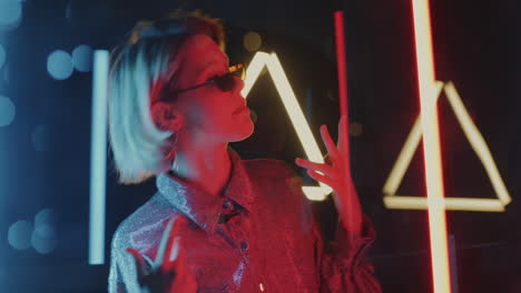 stylish woman in neon lights