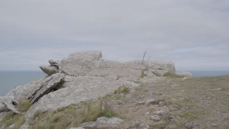 Coastal-Cliff-Edge-Slow-Motion-with-Sea-View-Background-with-Cloudy-Sky-North-Devon-UK