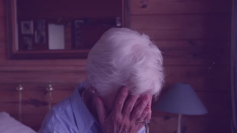 animation of grey texture moving over devastated caucasian senior woman