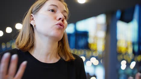 woman speaking in a restaurant