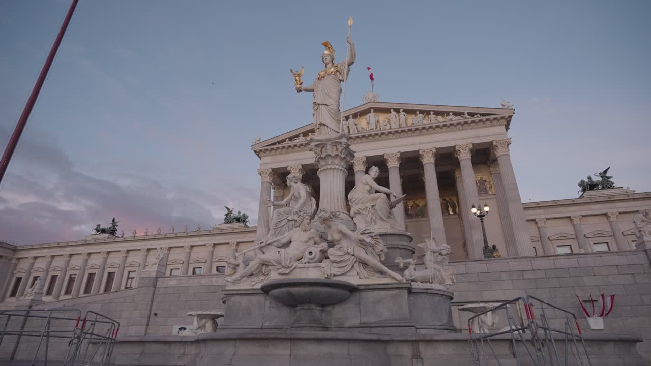 Pallas Athene Fountain and Austrian Parliament Building in Vienna