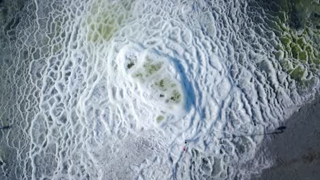 an aerial shot of the mysterious maribilite formations that were first discovered in 2019 on the shores of the great salt lake